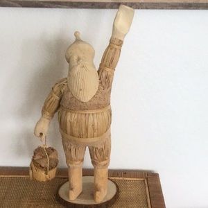 In excellent condition, vintage hand made corn husk Santa .